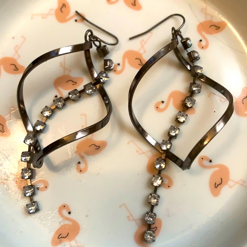 Black swirl earrings with gems